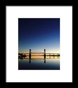 Cape Fear River at sunset with big blue sky - Framed Print